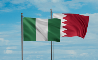 Nigeria And Bahrain Flags Waving Together