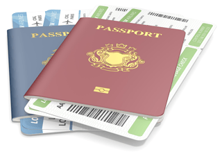 Passports And Flight Tickets Stacked Together