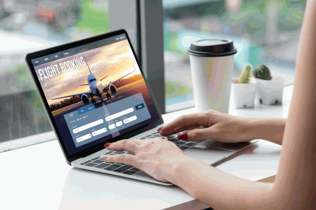 A Person Booking A Flight Ticket