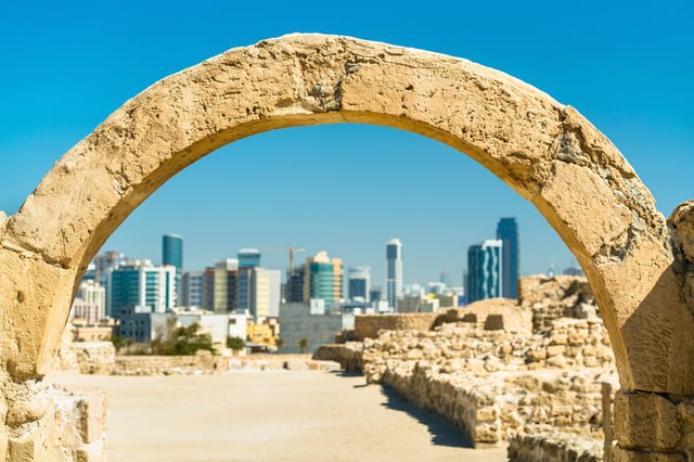 Skyline of Manama in Bahrain under an arch