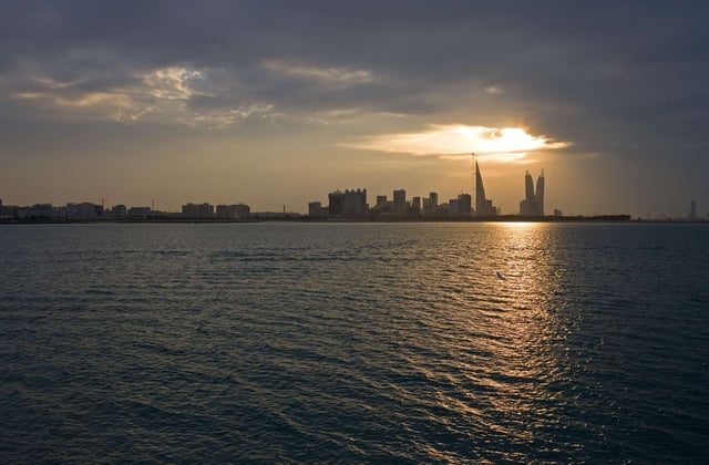 View of Manama at sunset from the La Shaikh Isa causeway
